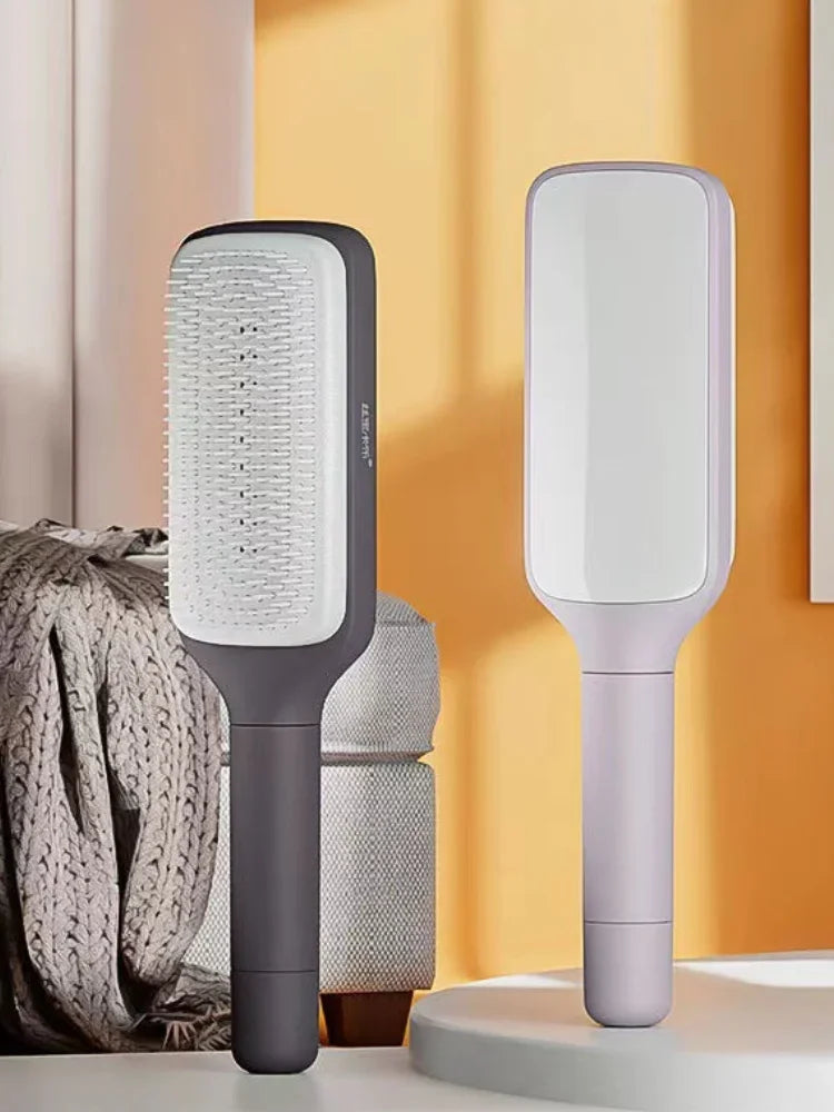 Modern hairbrushes with soft bristles, sleek gray and lavender design for daily grooming and detangling